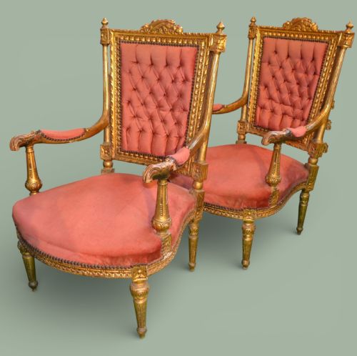 Pair of French gilt decorative armchairs